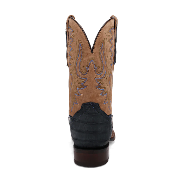 Dan Post Leon boots: tan suede upper with blue stitching, dark caiman foot. Square toe, pointed shaft with scalloped top. Stacked wooden heel. Combines suede/caiman textures.
