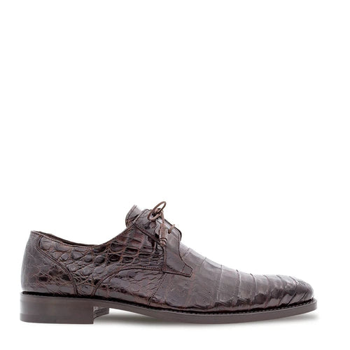 Mezlan Anderson men's exotic lace-up shoe in dark brown crocodile leather. Features a structured, rounded-toe design with a low-profile silhouette and textured reptile skin pattern. Includes a lace-up closure and low heel. Polished finish.
