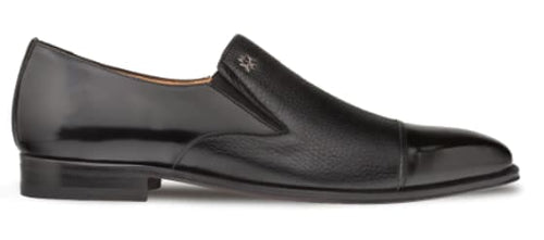 Milani slip-ons: black calfskin & deerskin. Sleek, rounded-toe silhouette with raised heel. Calfskin upper, textured deerskin accents. Elastic sides for easy wear. Minimalist design.
