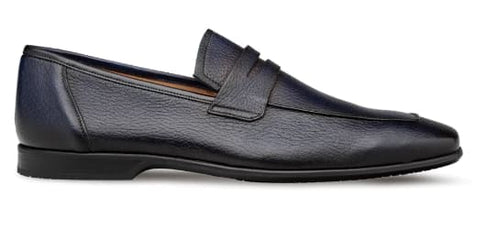 Men's blue deerskin penny loafers. Sleek, rounded-toe design with a vamp strap. Textured deep blue deerskin upper, contrasted by a black sole. Low-profile, elegant and simple.
