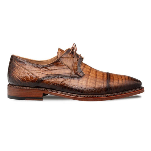 Giovan Fuscus men's camel crocodile cap toe derby shoes. Pointed toe, cap detail. Crocodile leather upper. Brown wood finish sole. Matching laces. Elegant and textured design.

