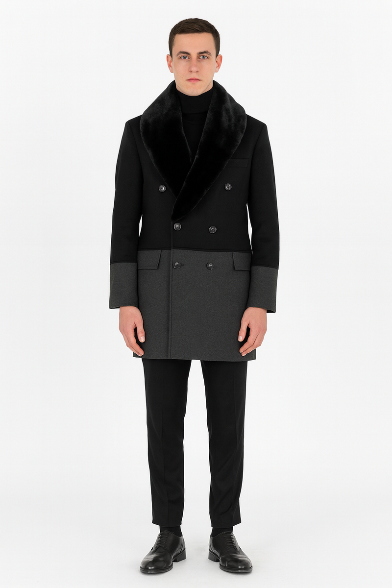 Men's double-breasted wool overcoat with faux fur shawl collar. Black and charcoal grey color-blocked design. Tailored silhouette, slightly relaxed fit.
