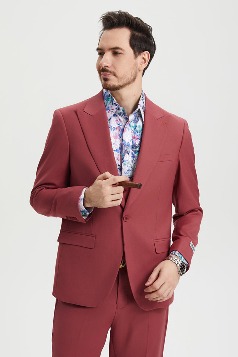 Coral blush pink Stacy Adams men's suit: fitted, one-button closure, peak lapels. Includes matching vest. Smooth, tailored fabric, creating a vivid, cohesive look. Two front pockets.
