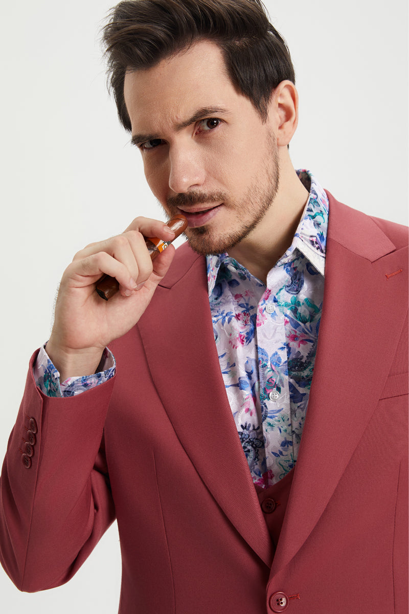 Coral blush pink Stacy Adams men's suit. Features a tailored, one-button peak lapel vest with a smooth fabric, buttoned front, contouring lines, and two side pockets.
