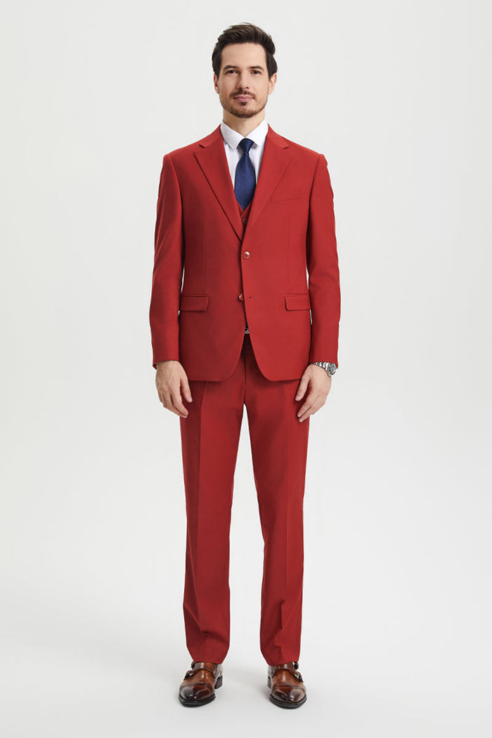 Stacy Adams brick red men's suit: structured, tailored fit. Two-button closure, notch lapels, vested interior. Flat-front trousers, straight-leg. Sleek, modern silhouette. White shirt, dark tie included.

