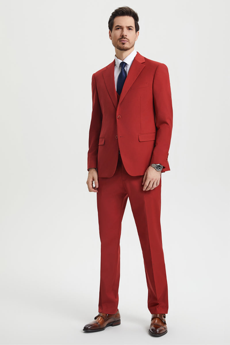Stacy Adams men's brick-colored, two-button vested suit. Slim-fit structured blazer with notched lapels. Tailored pants matching the blazer for a cohesive look.
