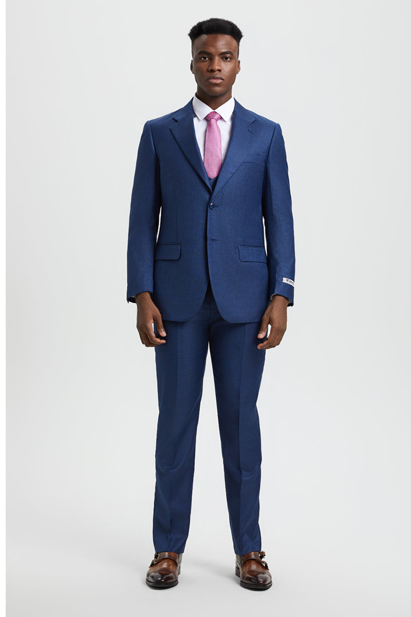 Stacy Adams men's blue sharkskin suit: fitted, two-button with vest. Structured blazer, flat-front trousers. Textured fabric with slight sheen. Notched lapel, slim fit.
