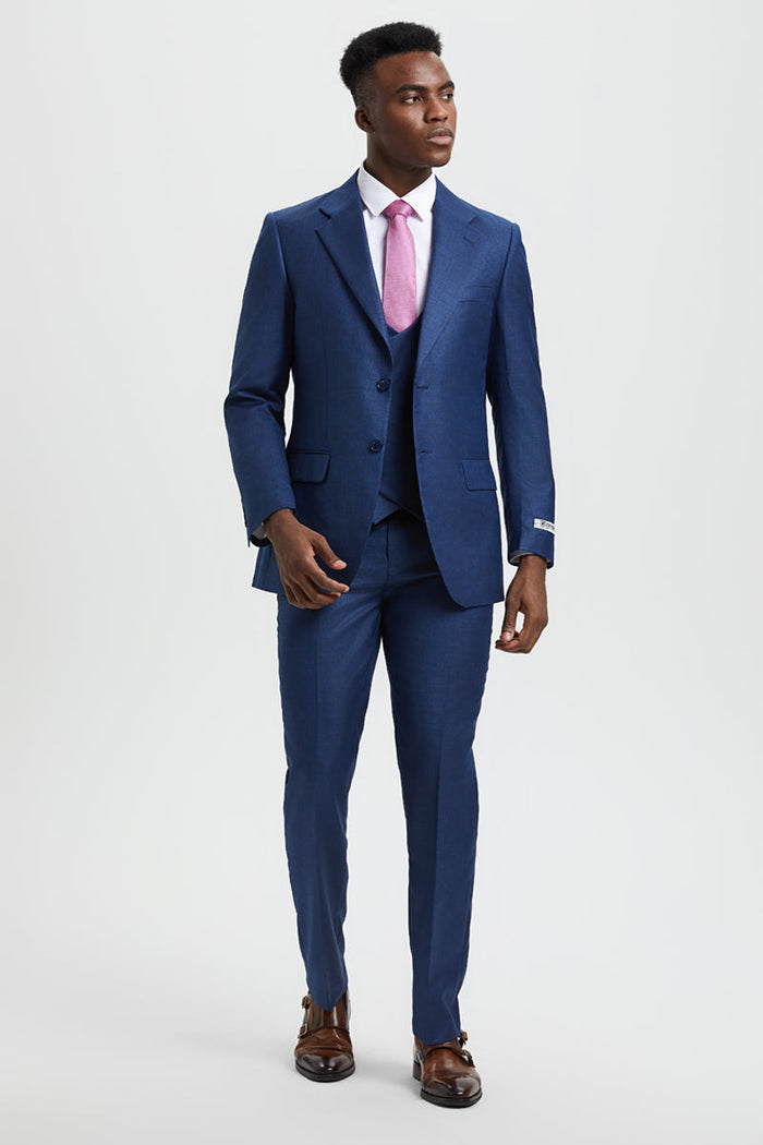 Men's Stacy Adams sharkskin suit: fitted, mid-blue, 2-button blazer with notch lapels, vest, and straight-leg trousers. Subtle texture for a streamlined silhouette.