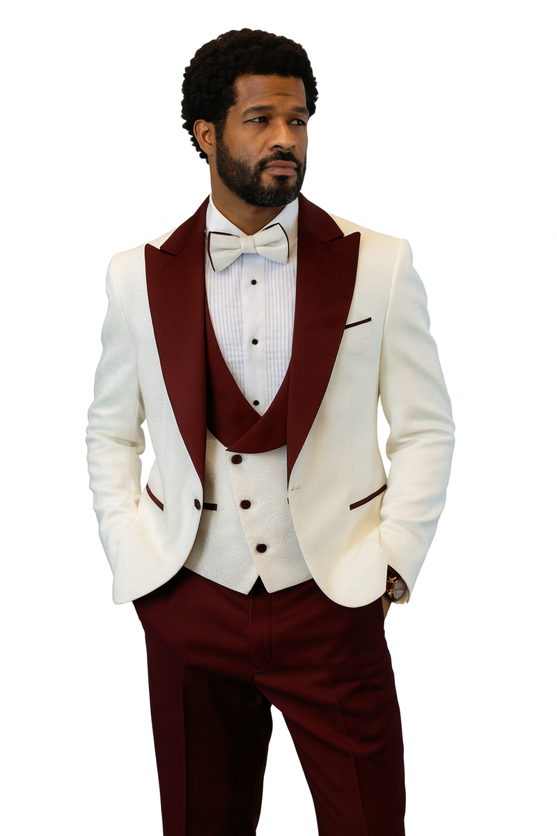 Hilton tuxedo: white paisley jacket with burgundy accents, peak lapel. Matching shawl vest, burgundy wool pants. Bow tie included. Stylish, formal ensemble.
