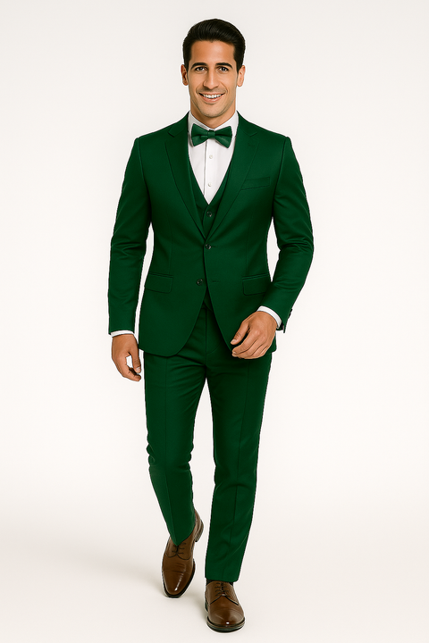 Emerald green Alberto Nardoni tuxedo set: tailored jacket, matching vest, formal trousers, and bow tie. Matte finish, smooth fabric, fitted silhouette. A coordinated, formal look.
