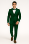 Emerald green Alberto Nardoni tuxedo set: tailored jacket, matching vest, formal trousers, and bow tie. Matte finish, smooth fabric, fitted silhouette. A coordinated, formal look.
