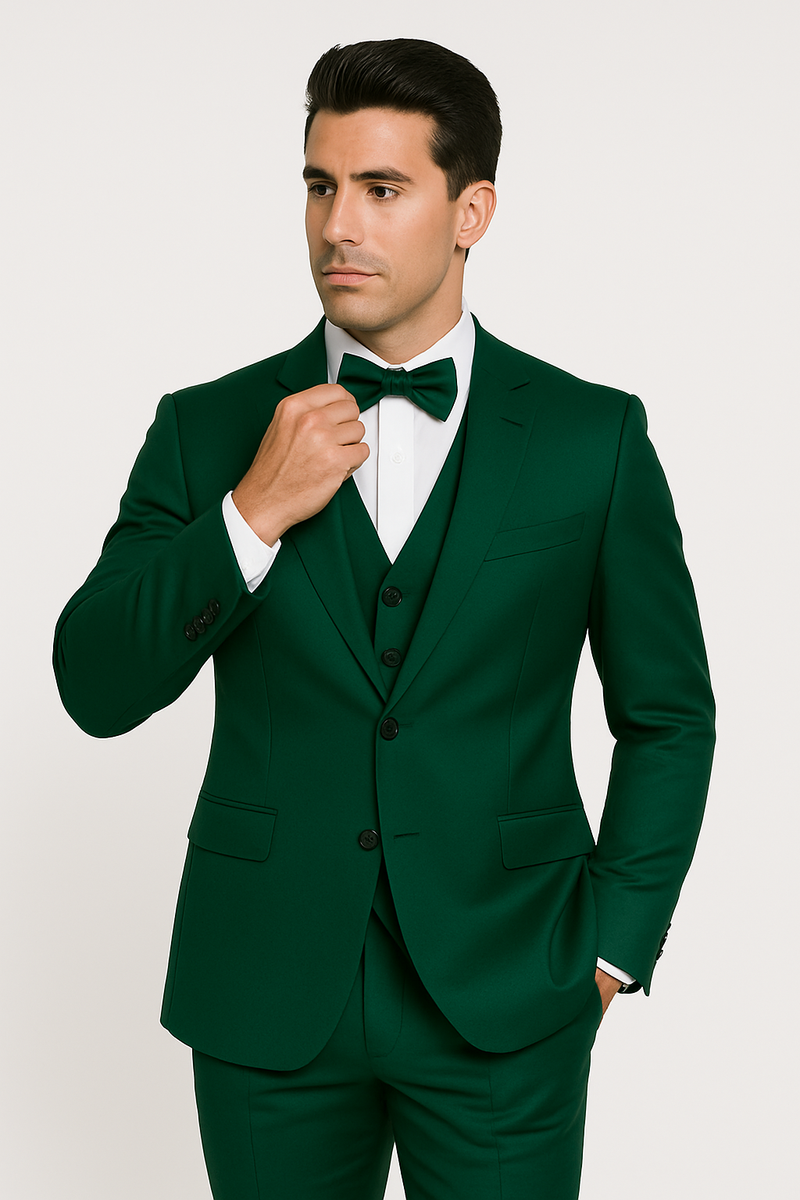 Alberto Nardoni's emerald green tuxedo: tailored jacket (structured, 2 buttons), matching waistcoat & trousers. Smooth fabric, matching bow tie. Vibrant, pattern-free emerald throughout.