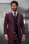 Men's burgundy houndstooth plaid suit. Vested design with wide peak lapel. Includes tailored jacket with buttons, defined shoulders, and matching trousers. Vest in contrasting solid color. Formal, well-tailored.
