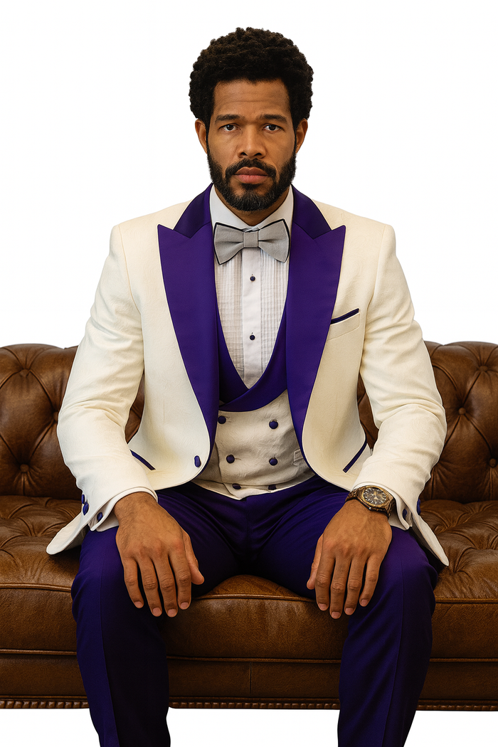 White tuxedo jacket with purple lapel & pockets. Includes a light shawl vest w/ purple buttons, purple wool pants, & bow tie. Fitted silhouette.
