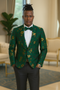 Men's slim-fit hunter green tuxedo jacket. Gold paisley & floral patterns. Single-breasted, notched lapels. Decorative buttons on sleeves. Two front pockets.
