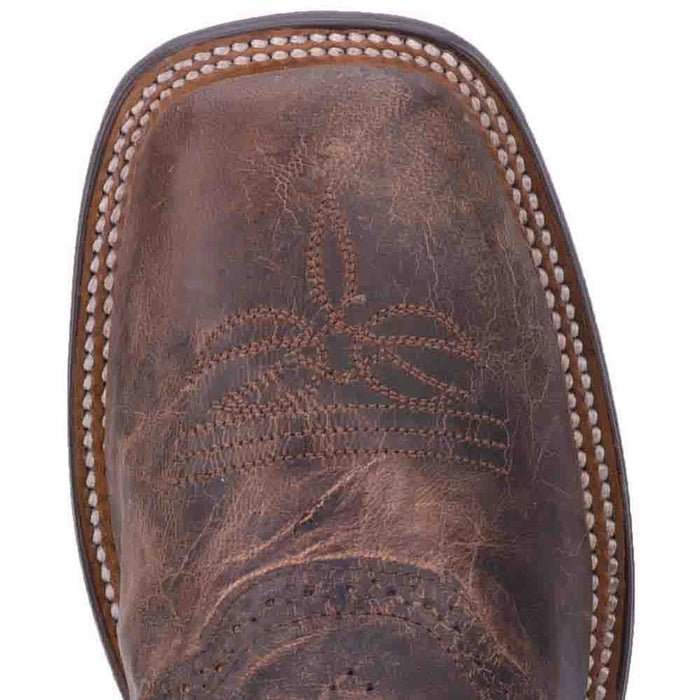 Dan Post Franklin boot. Dark chocolate leather, distressed finish. Broad square toe, decorative stitching, floral toe cap detail. Rugged, structured shape with contrasting edge stitching.
