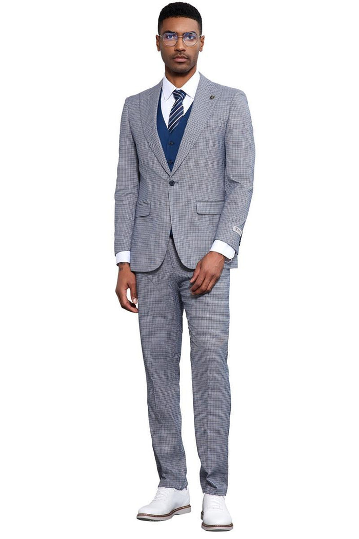 Men's Stacy Adams light blue vested suit with micro check pattern. Features a one-button jacket with peak lapels, matching trousers, and a blue vest. Lightweight, textured fabric.
