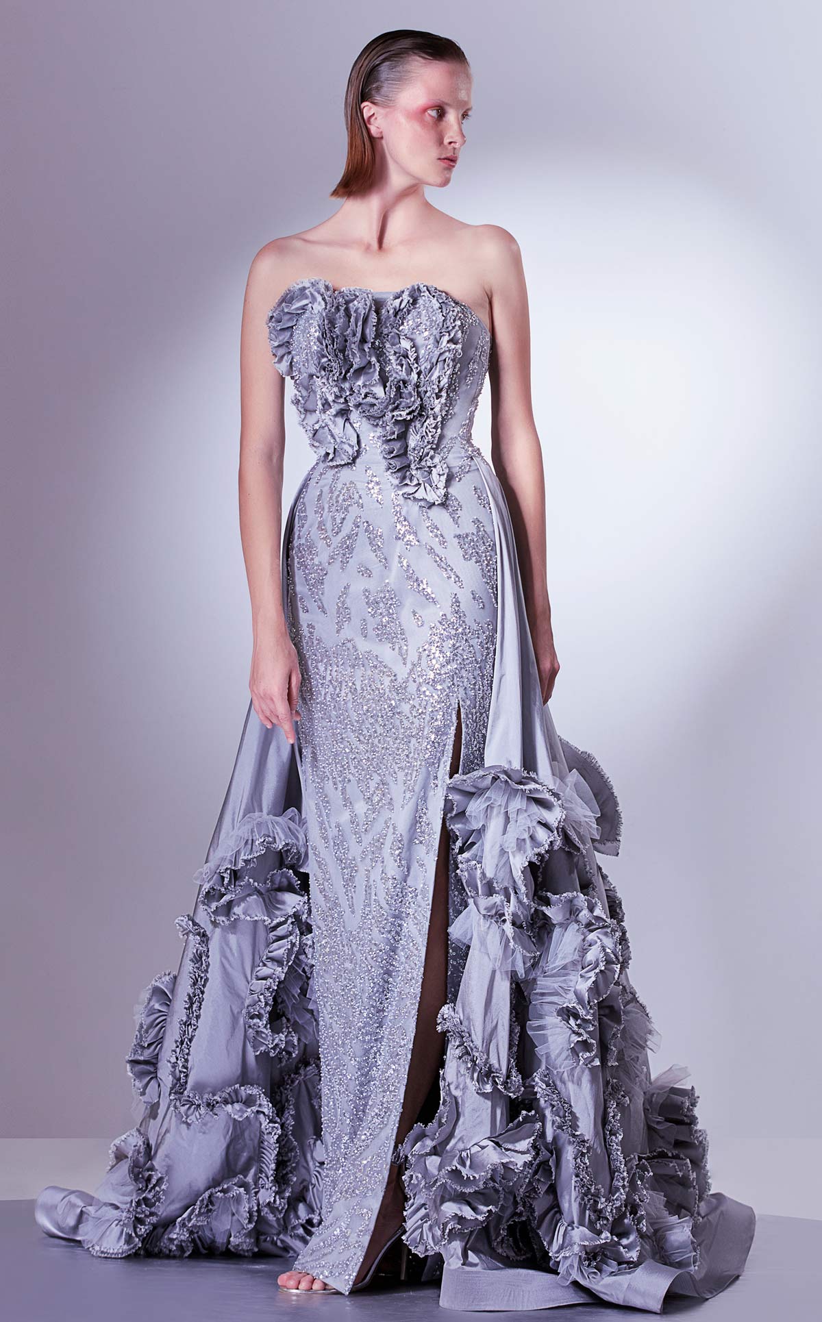 Gaby Charbachy G1330 Silver Strapless Sequined Gown with Overskirt by MNM Couture