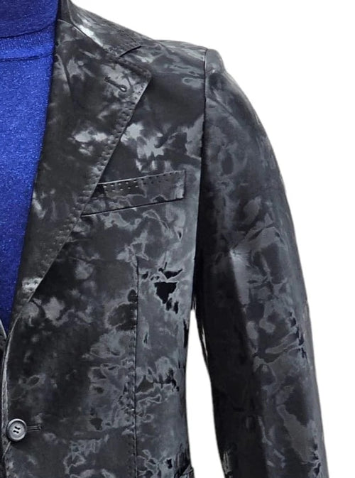 Alberto Nardoni's slim-fit two-piece suit with camouflage design. Black textured fabric, notched lapel, single chest pocket, and a two-button closure on the jacket.
