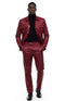 Burgundy faux leather two-piece suit with textured finish. Slim fit jacket features two chest pockets and single-button closure. Matching slim trousers complete the look.
