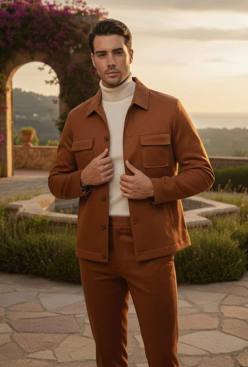 Men's brown faux leather slim fit suit. Includes a button-up jacket with pockets and matching tapered trousers. Casual and stylish two-piece set.
