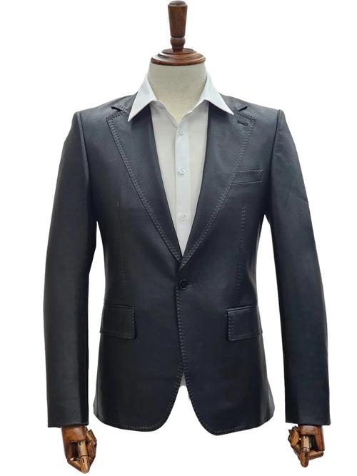 Men's black slim fit leather suit. Single-button closure, notched lapels, two pockets. Smooth leather, modern silhouette. Long sleeves, clean finish. White shirt visible.
