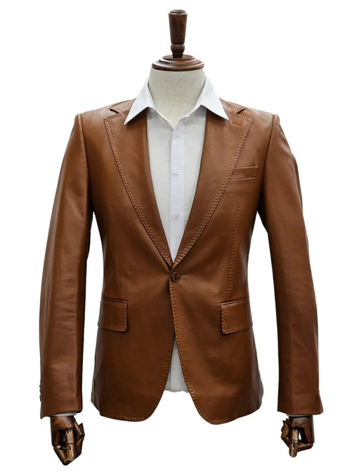 Men's slim fit caramel leather suit by Alberto Nardoni. Single-button closure, notched lapels, two front pockets. Smooth leather texture and fitted silhouette.
