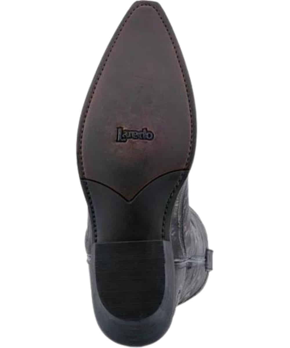 Laredo Men's Garrett Boot: Pointed toe, sleek profile. Dark, smooth leather sole with a slight curve. Visible side stitching for enhanced durability.
