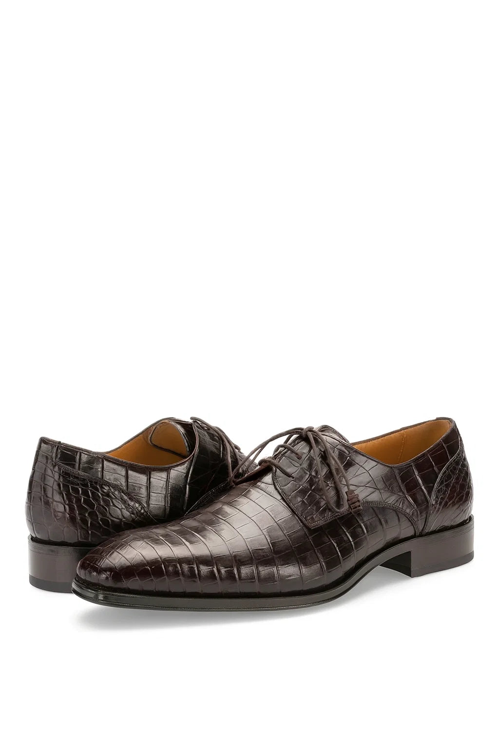 Men's brown alligator derby shoes with pointed toe. Genuine textured alligator leather upper, leather lining, and stacked heel. Lace-up closure for secure fit.
