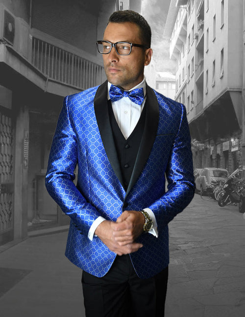 Royal blue men's one-button shawl tuxedo with geometric chain print and black lapel. Matching vest. Tailored lines for a structured fit.
