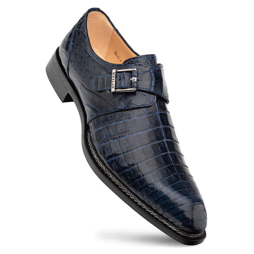 Mezlan Gigolo Blue Crocodile loafers: Single monk strap, pointed toe, deep blue crocodile-textured leather. Black stacked heel, light stitching. Natural leather lining. Stylish and textured design.
