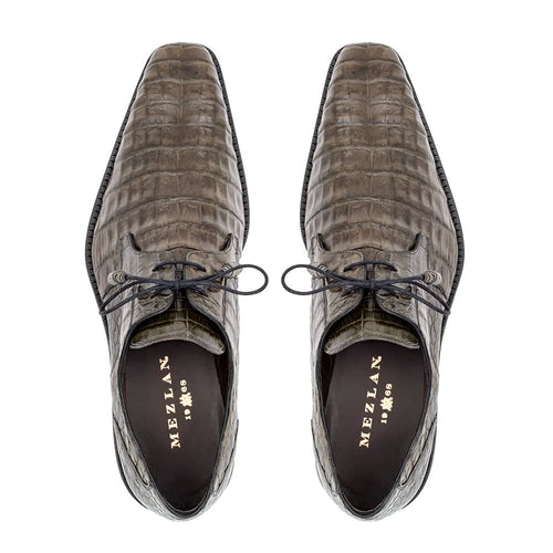 Dark gray crocodile Mezlan Anderson lace-ups. Pointed toe, textured leather, thin black laces. Contrasting dark sole. Branded insole with gold lettering.
