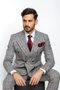 Grey wool suit with red plaid. Double-breasted jacket and wide-leg pleated pants. Classic pattern, entirely wool.

