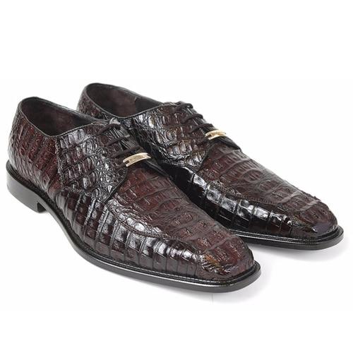 Dark brown Belvedere Chapo oxfords. Exotic crocodile hornback leather with elongated shape and streamlined silhouette. Textured pattern, smooth vamp with metal detail. Solid, slightly raised sole.

