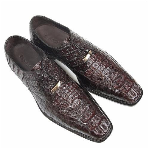 Exotic Belvedere Chapo oxfords in deep burgundy feature crocodile hornback leather, pointed toe, and metal accents. Streamlined design with rounded soles.
