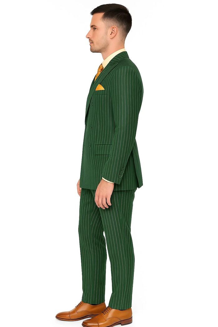 Hunter green, double-breasted pinstripe suit. Tailored cut with structured silhouette, white vertical stripes. Smooth fabric, jacket with wide lapel and buttons. Slim-fit trousers. Worn with light shirt and tie, cohesive ensemble.
