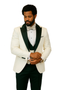 White paisley tuxedo jacket with black peak lapels, matching shawl vest, and wool pants. Includes a patterned bow tie. Classic, elegant formal wear.
