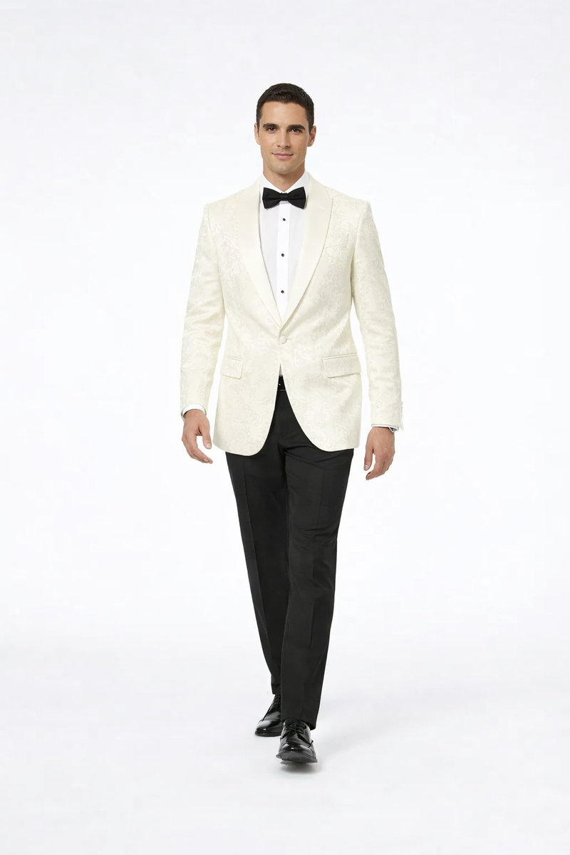 Men's ivory paisley tuxedo jacket. Fitted, single-breasted, peaked lapels. Textured fabric with intricate paisley pattern. Two front pockets.
