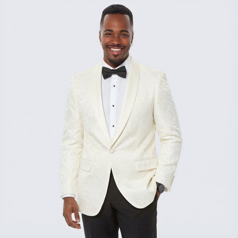 Alberto Nardoni men's ivory paisley tuxedo jacket. Fitted, structured, single-button closure, two pockets. Smooth fabric with intricate paisley pattern. Shawl collar in a lighter ivory shade. Primarily ivory.
