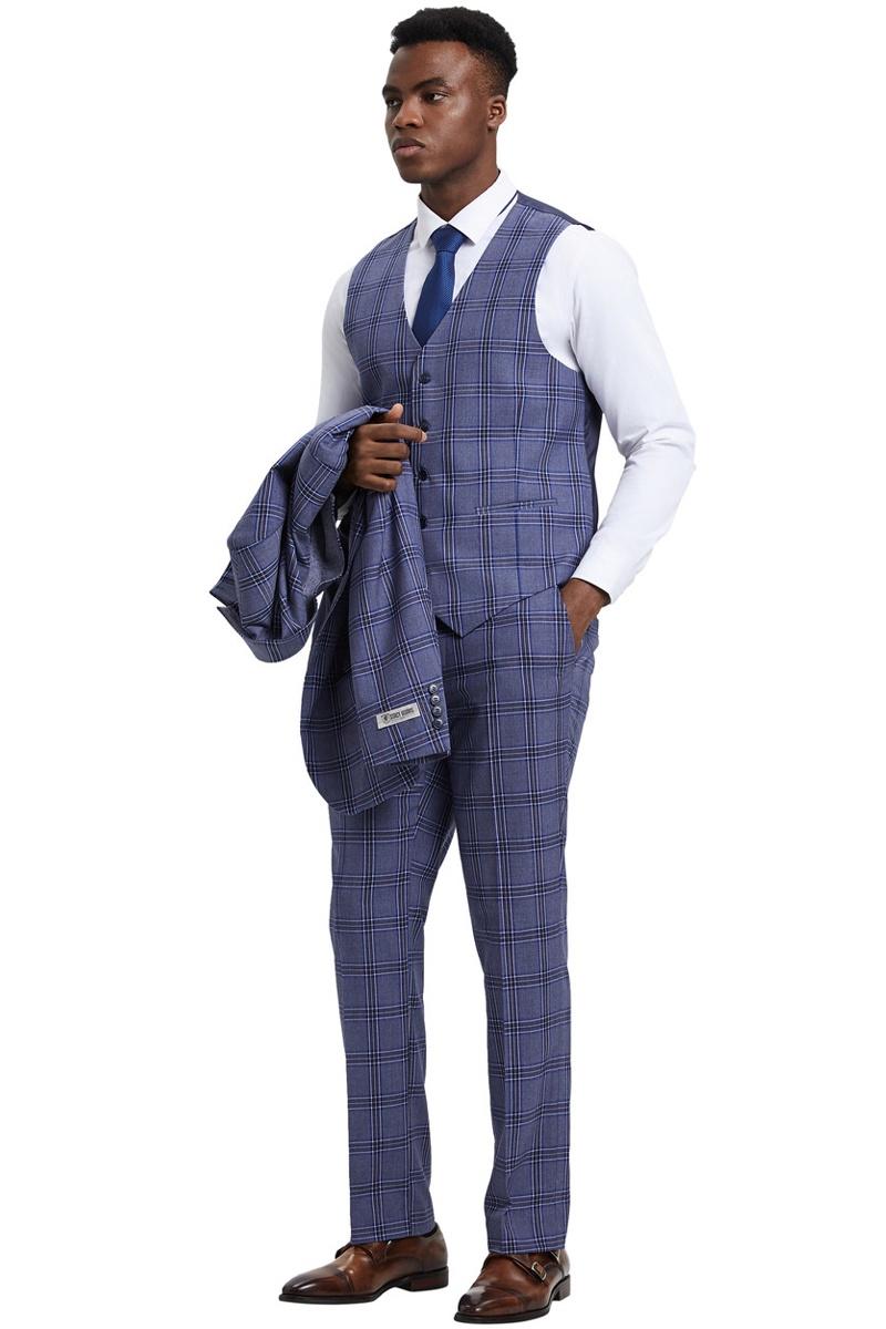 Stacy Adams men's light purple glen plaid suit. Two-button jacket, fitted vest, and tapered trousers. Features a patterned weave. Includes matching trousers and vest. The jacket is draped over the arm.
