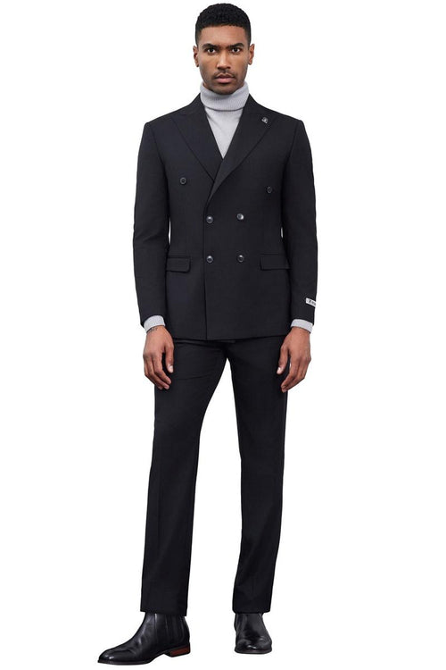 Stacy Adams men's black double-breasted suit. Tailored jacket, straight-cut trousers, slim fit. Smooth, likely wool blend fabric with subtle sheen. Paired with gray turtleneck, black ankle boots, maintaining a dark aesthetic.
