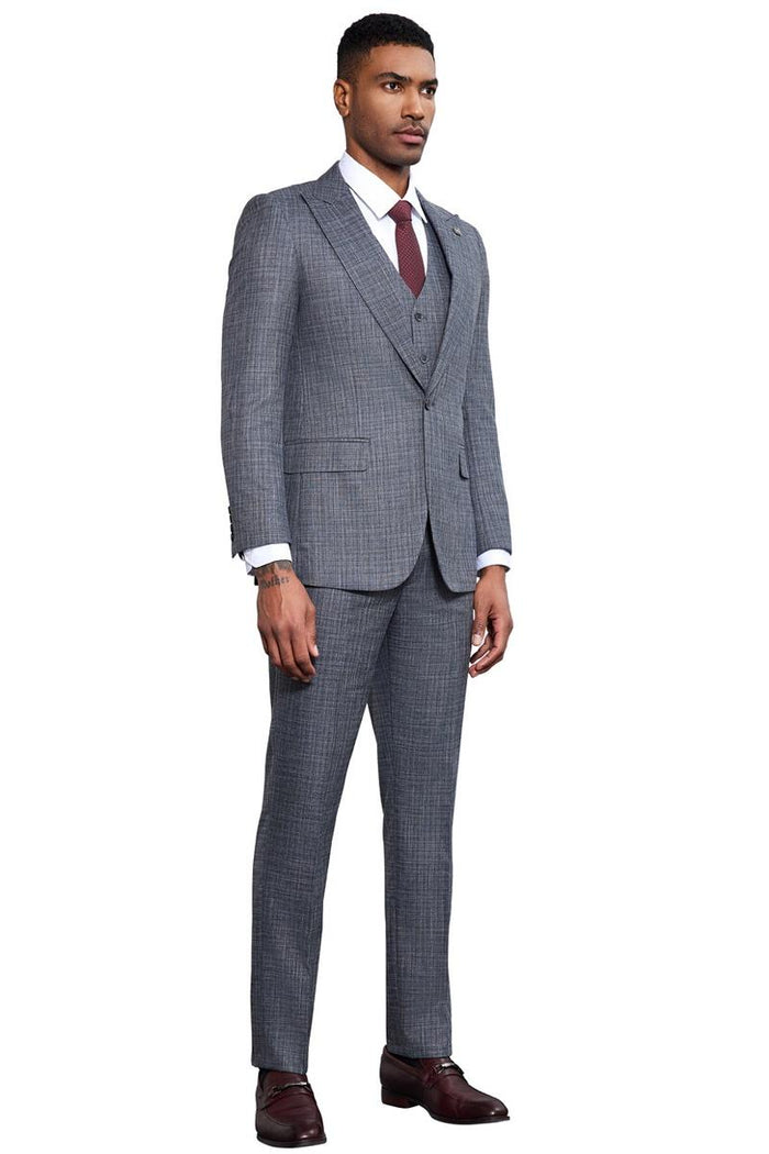 Men's Stacy Adams sharkskin suit in grey: tailored jacket, matching trousers, and a three-button vest. Features a textured weave, notch lapel, flat-front trousers, and a slim profile.
