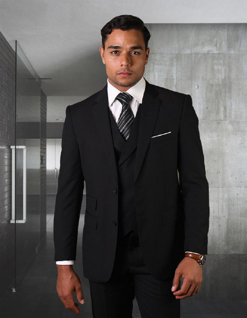 Men's black wool slim fit suit. Tailored 2-button jacket, double-breasted vest, and matching trousers. Solid color, smooth wool finish.