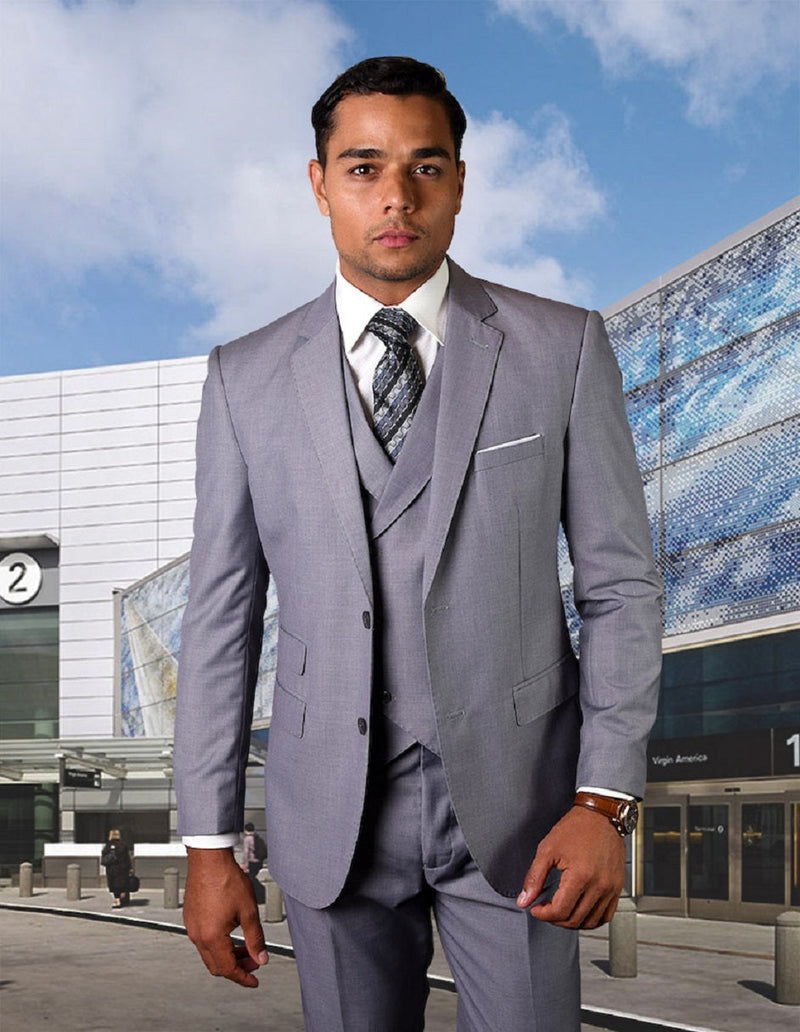 Men's slim fit grey wool suit with a double-breasted vest. Features straight lapels, two front pockets, and a tailored silhouette. Includes matching trousers.
