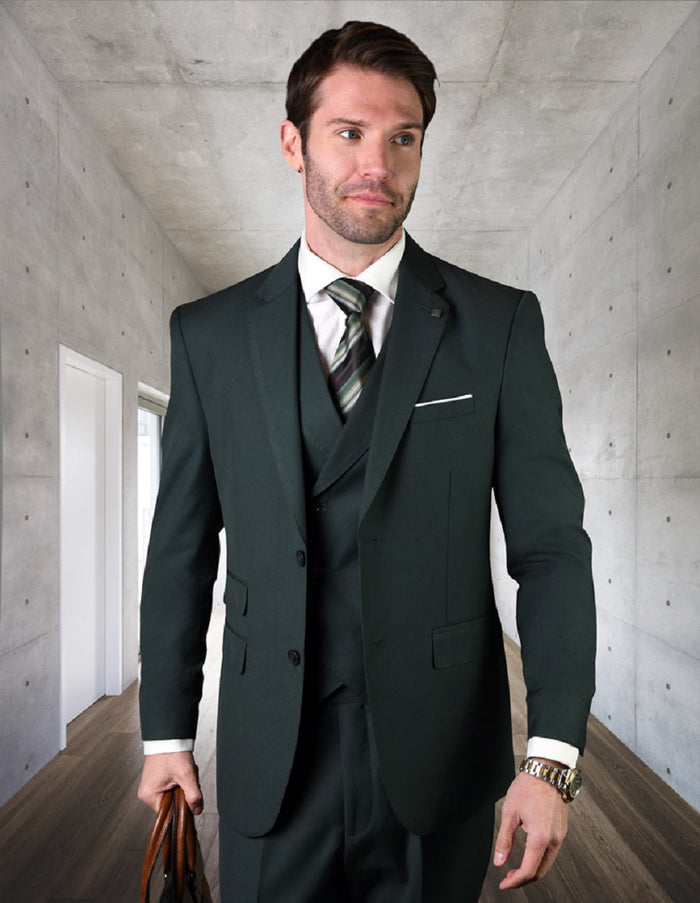 Hunter green, slim-fit men's suit. Two-button jacket, double-breasted vest. Primarily wool, tailored silhouette with notched lapels. Smooth fabric. Vest features button details.

