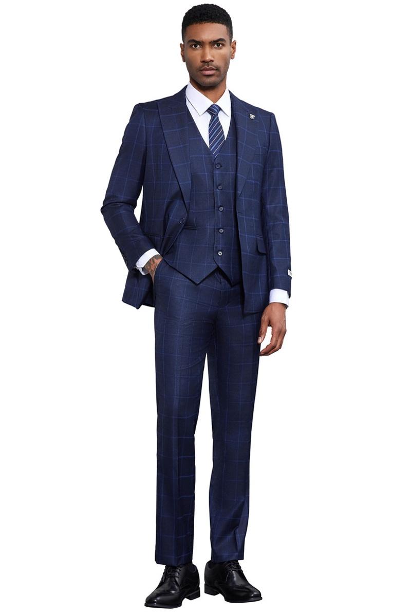 Navy Stacy Adams suit: classic one-button blazer with a vested interior. Windowpane pattern in contrasting hue. Matching tailored trousers. Smooth, polished finish for a formal look.
