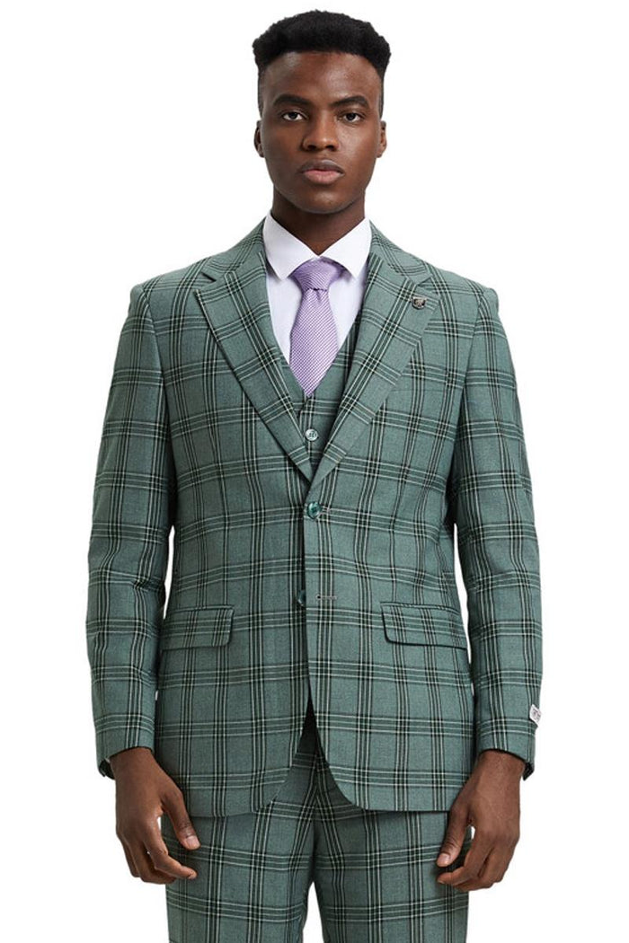 Men's Stacy Adams light olive glen plaid suit. Two-button blazer with notched lapels, matching vest. Intricate green/white pattern. Features front button closure, two pockets, and single-button cuffs. Smooth, textured fabric.
