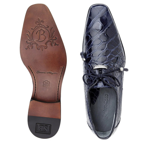 Navy alligator Belvedere Lago dress shoe. Rounded toe, lace closure. Embossed logo insole. Brown leather sole with black rubber tip, intricate design.
