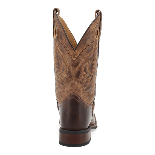 Laredo Men's Kane boot: tall, pointed shaft, brown leather exterior with stitched detail. Features lighter leather panel, pull tabs, and a rubber sole.
