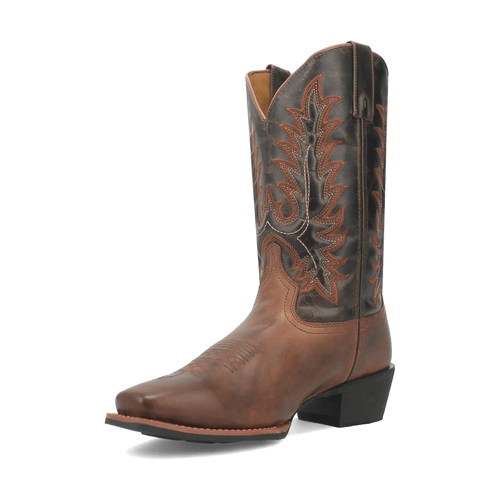 Laredo Men's Kent Leather Boot: Tall brown leather shaft, distressed finish, pointed toe. Intricate contrasting stitching. Block heel. Unique leaf-like side pattern for a stylish, stable boot.
